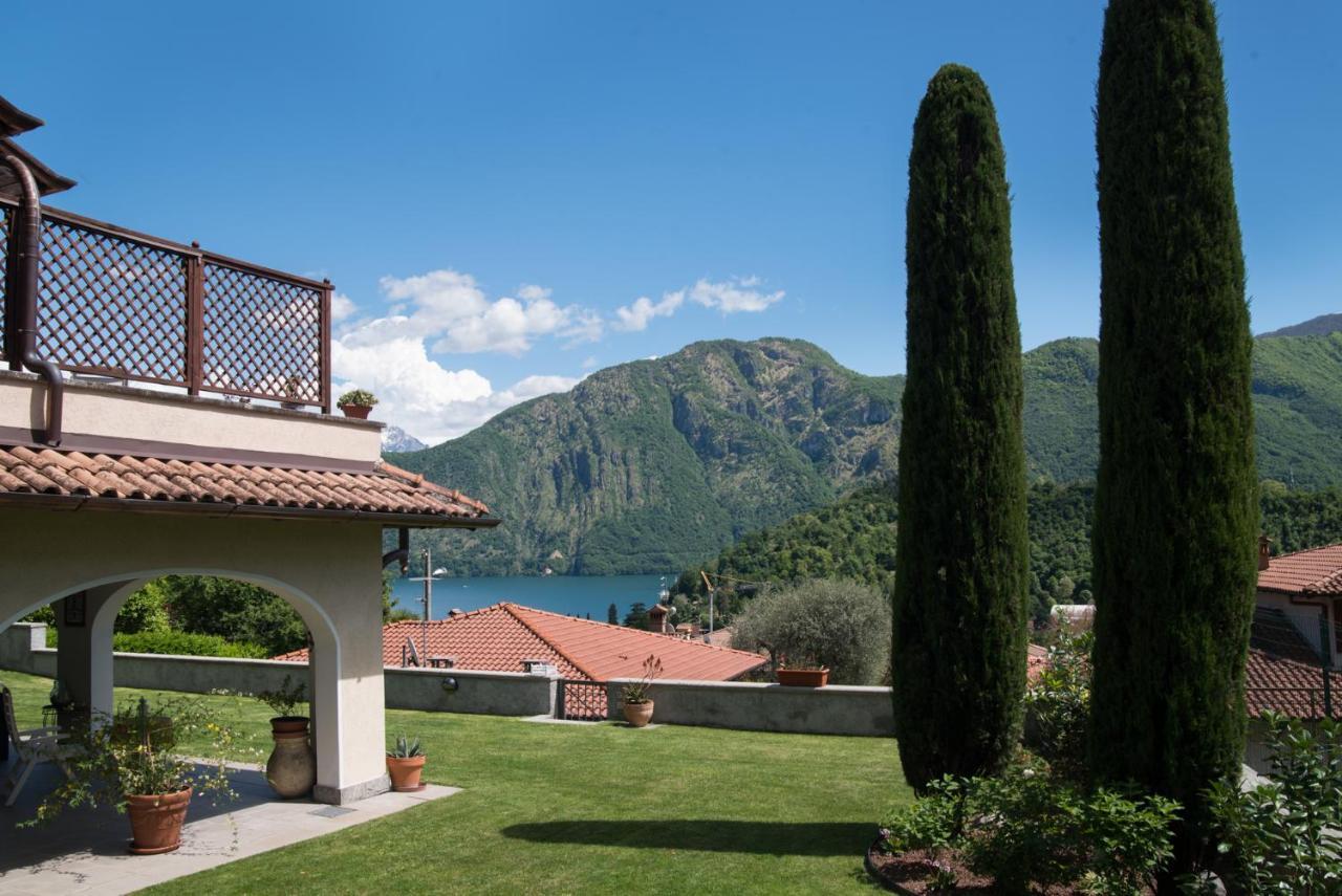 Ferienwohnung Mansarda I Cipressi Lenno Exterior foto