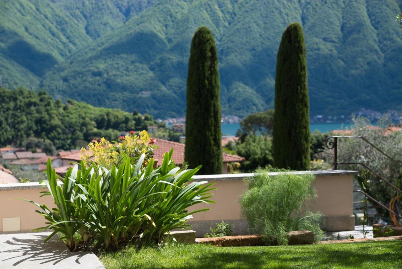 Ferienwohnung Mansarda I Cipressi Lenno Exterior foto