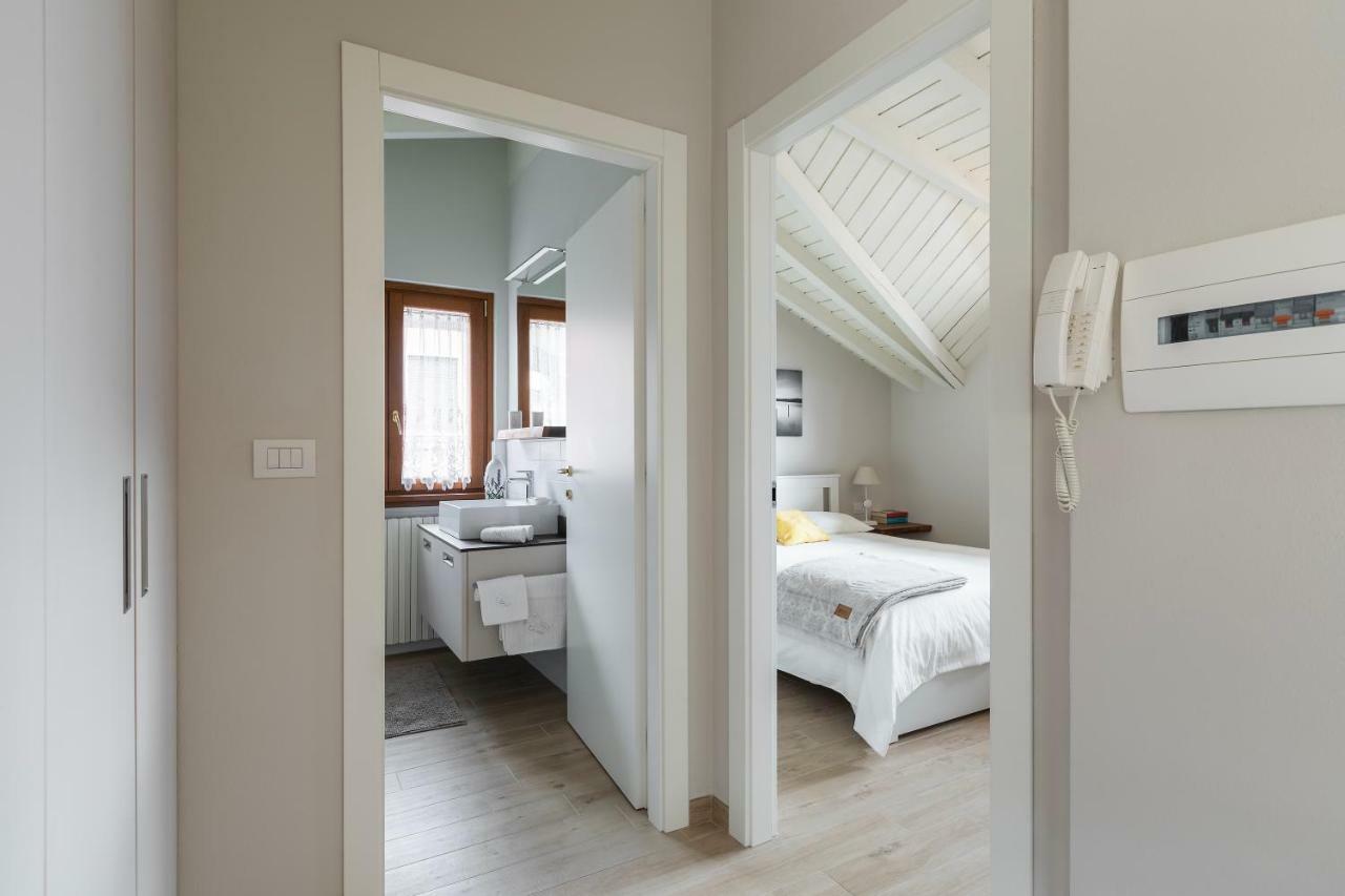 Ferienwohnung Mansarda I Cipressi Lenno Exterior foto