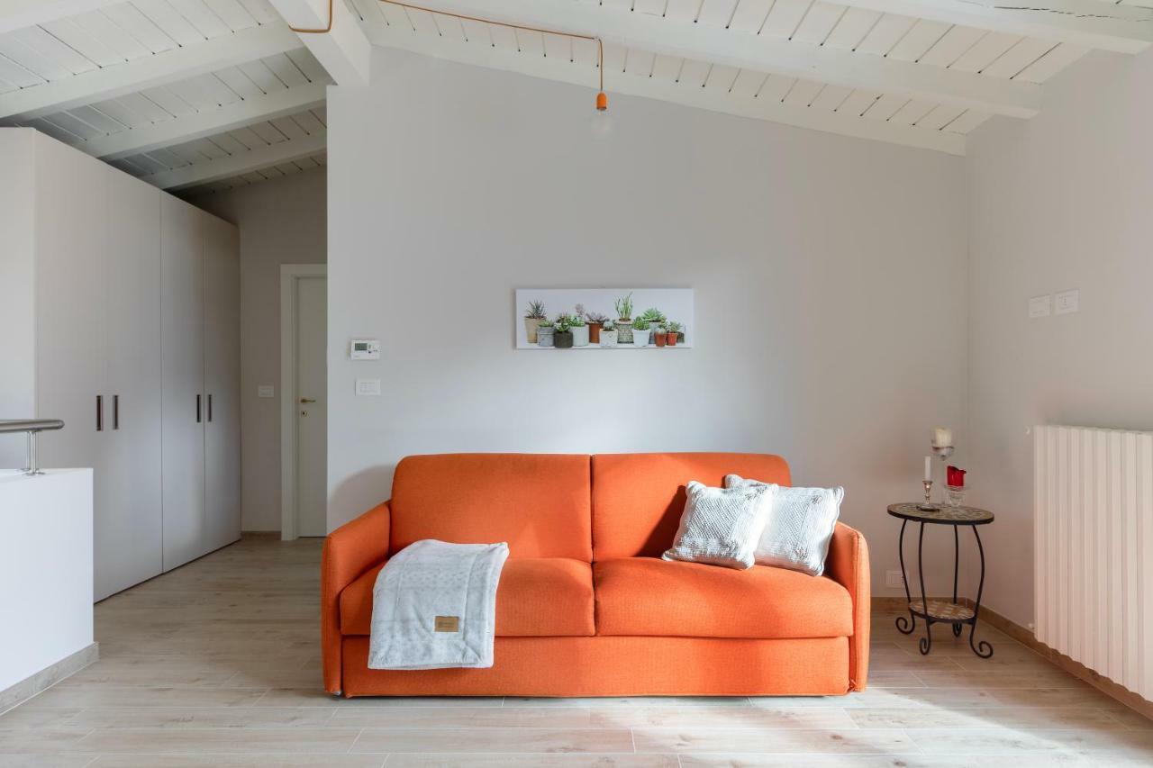Ferienwohnung Mansarda I Cipressi Lenno Exterior foto