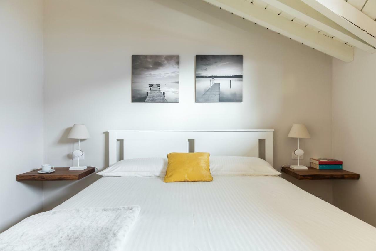 Ferienwohnung Mansarda I Cipressi Lenno Exterior foto