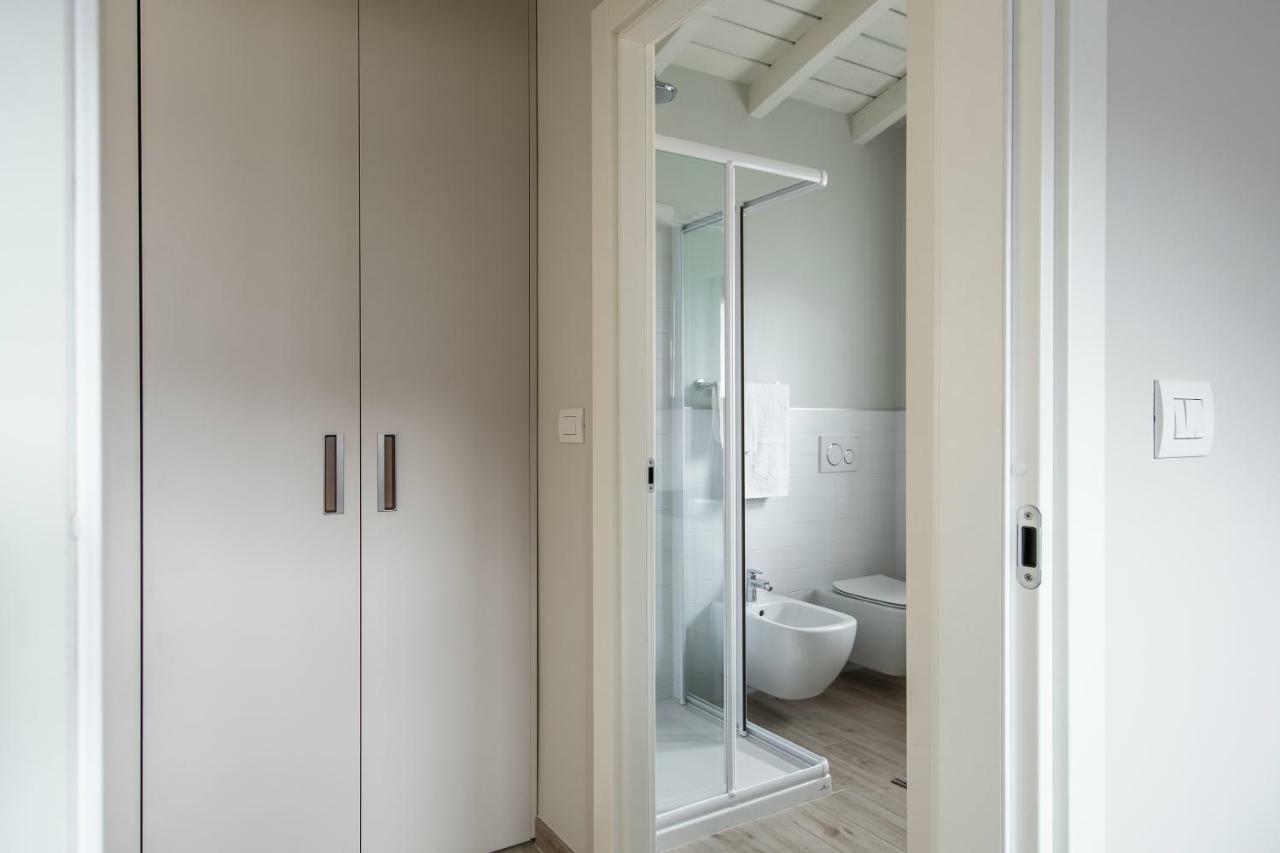 Ferienwohnung Mansarda I Cipressi Lenno Exterior foto