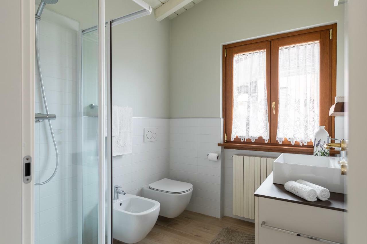 Ferienwohnung Mansarda I Cipressi Lenno Exterior foto