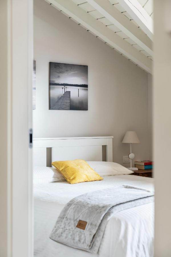 Ferienwohnung Mansarda I Cipressi Lenno Exterior foto