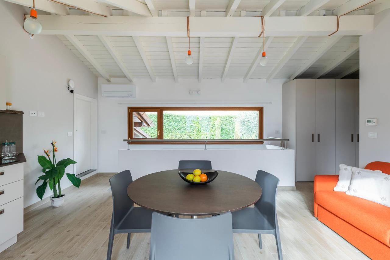 Ferienwohnung Mansarda I Cipressi Lenno Exterior foto